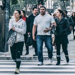 Group of people walking downtown